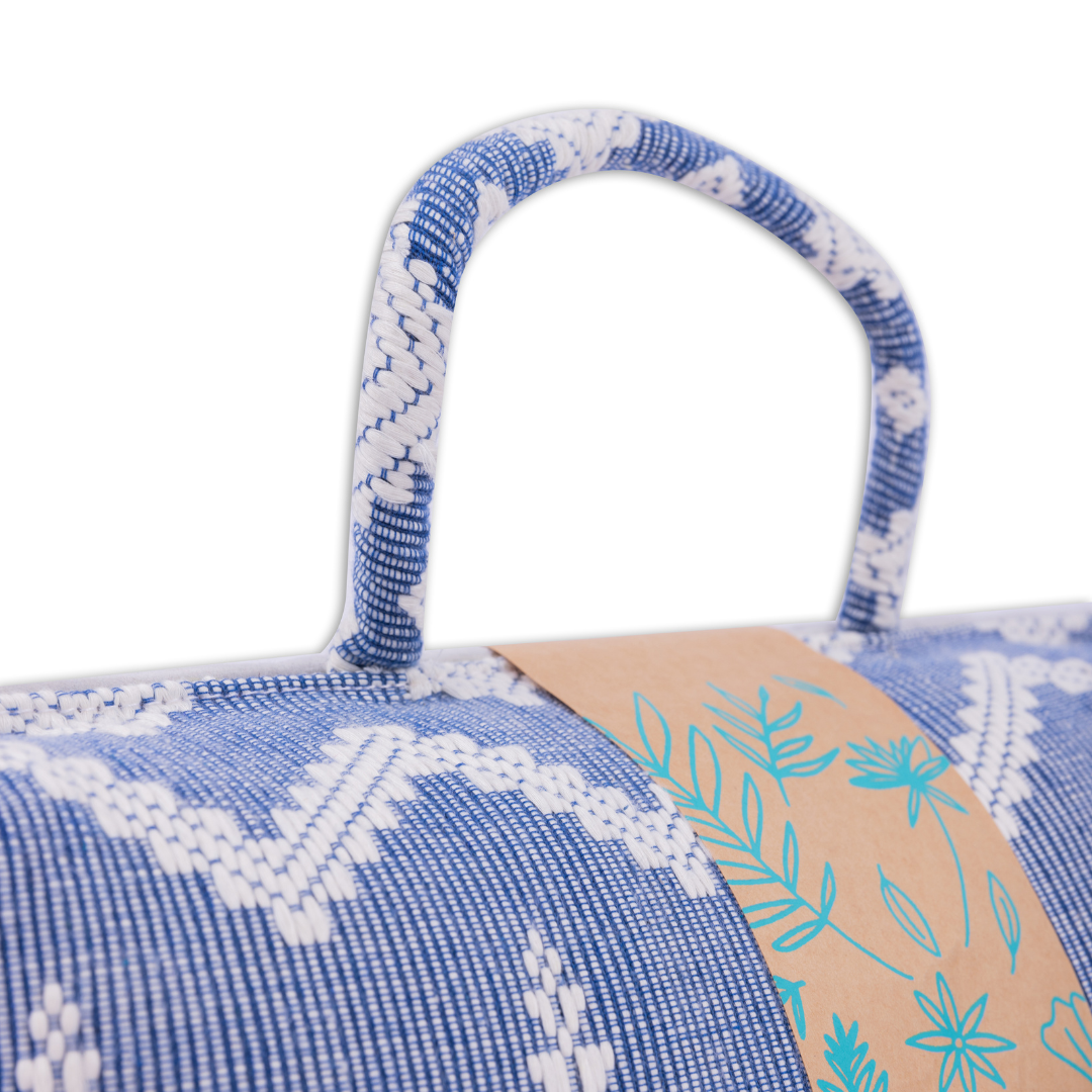 Hazel Inabel Blue Feather Laptop Pillow made from traditional Abel Iloco handloomed fabric with a faux suede non-slip top and convenient handle for easy portability.