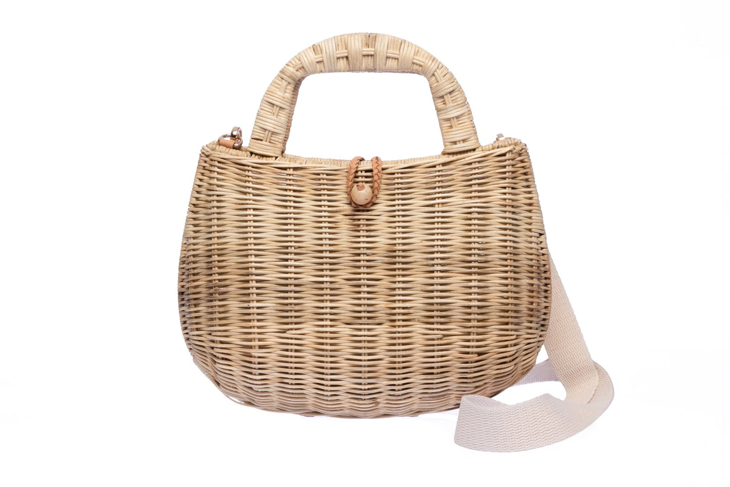 Handwoven Abi Wicket Natural Rattan Shoulder Bag with cotton strap and brass hardware, eco-friendly design, and artisan-crafted in the Philippines.
