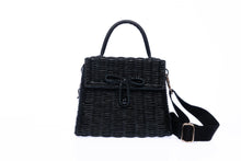 Load image into Gallery viewer, Adie wicker black shoulder bag, handwoven from sustainable rattan with a cotton strap and brass hardware, perfect for eco-conscious style.