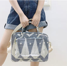 Load image into Gallery viewer, Handwoven Abel Iloco laptop bag with geometric designs, faux suede non-slip top, and handle. Ethically crafted in the Philippines.