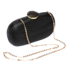Load image into Gallery viewer, Dark Sky Oval handwoven clutch with agate stone and brass chain strap, perfect for evening events. Ethically made in the Philippines.