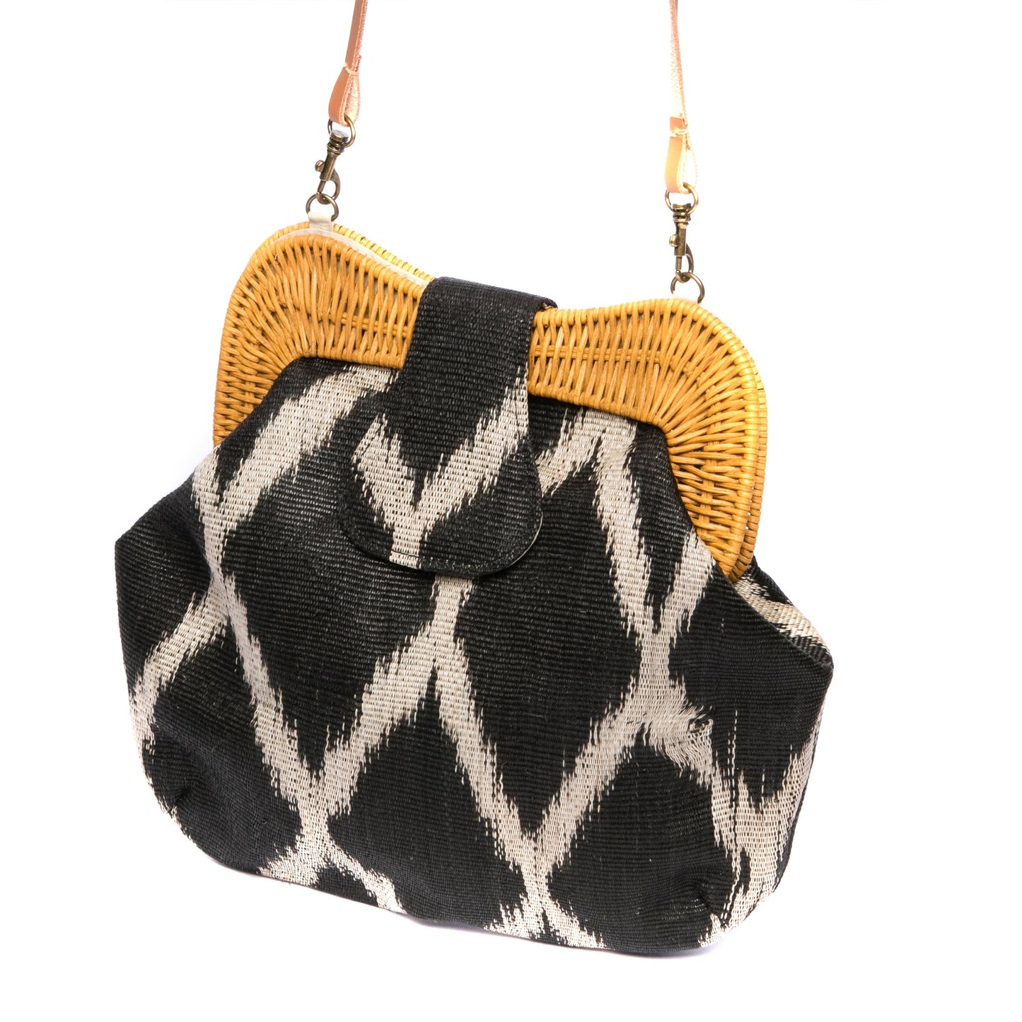 Diamond Dusk Libby handwoven purse with a rattan frame, diamond pattern, and leather strap. A versatile and eco-friendly accessory.