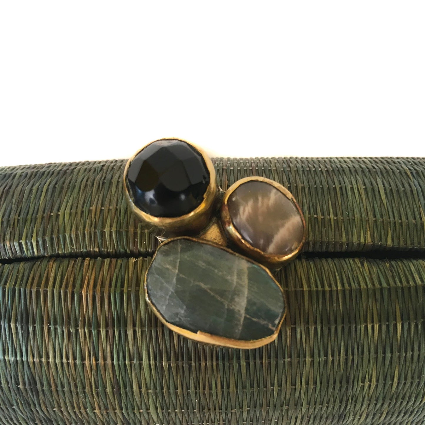 Grass is Greener Oval Hard Case Purse – Handwoven Buri fiber purse with agate stones wrapped in brass, featuring a brass chain strap for versatile styling.