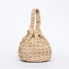 Load image into Gallery viewer, Rie Pouchette wristlet and shoulder bag, handcrafted from sustainable abaca plant fiber with delicate crochet detailing and adjustable leather strap for versatile use.