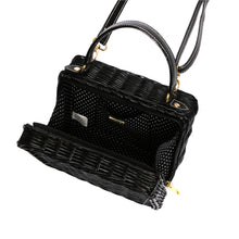 Load image into Gallery viewer, Serene Waters Wicker Bag made from handwoven rattan with an adjustable leather strap and cotton lining. Perfect for holding essentials with a chic and sustainable design.