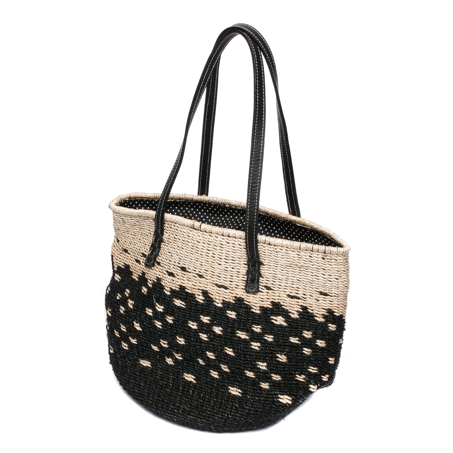 Starry Night Tote made from natural plant fiber with soft cow leather handles and a spacious interior for everyday essentials. Perfect for casual or elegant outfits.