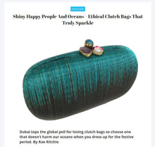 Load image into Gallery viewer, Turquoise Dream Oval Hard Case Purse made from handwoven Buri fiber, adorned with agate stones and brass accents, with a versatile drop-in brass chain for carrying as a clutch or shoulder bag.