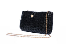 Load image into Gallery viewer, Myra Wicker Clutch Black handwoven from rattan with a brass chain strap and lined with linen and cotton, perfect for both day and night wear.