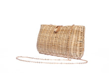Load image into Gallery viewer, Myra Wicker Clutch Natural handwoven from rattan, featuring a brass chain strap and a soft linen-cotton lining, perfect for both day and night occasions.