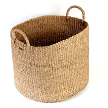 Load image into Gallery viewer, Camille Round Storage Basket made from 100% natural plant fiber, ideal for laundry, toy storage, and organizing essentials. Eco-friendly and stylish design.