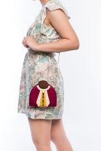 Load image into Gallery viewer, Gatsby Raspberry half-moon clutch made from handwoven natural plant fibers with a cracked sea shell bar and a brass chain strap, adding glamour and sophistication for any evening event.