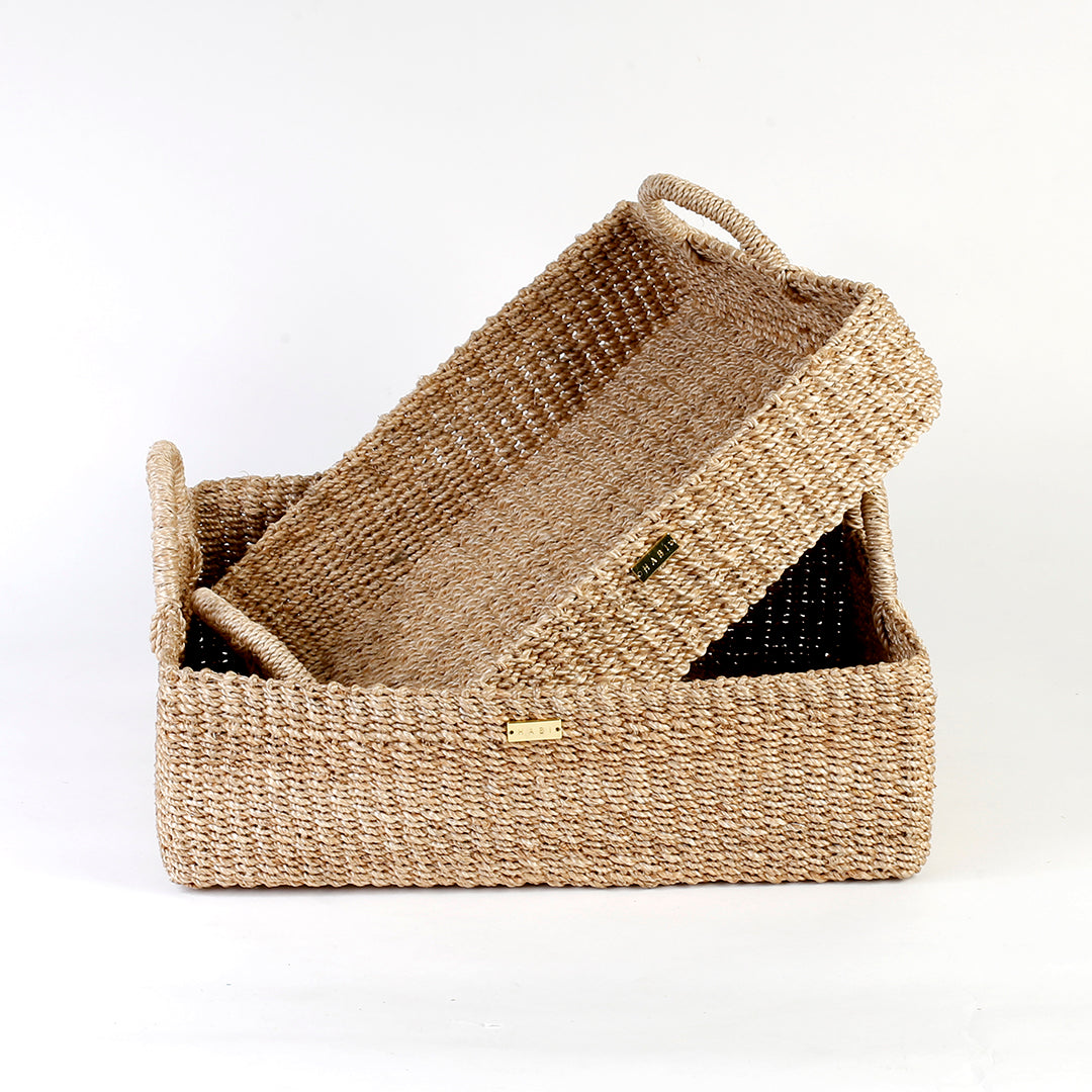 Stephanie Trays Set of 2, crafted from 100% natural plant fiber, ideal for organizing and displaying items around the home.