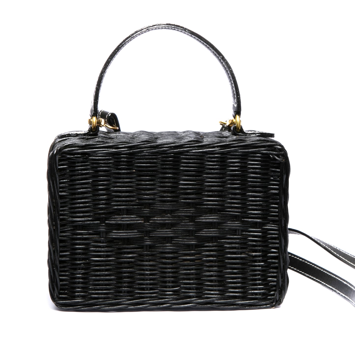 Serene Waters Wicker Bag made from handwoven rattan with an adjustable leather strap and cotton lining. Perfect for holding essentials with a chic and sustainable design.