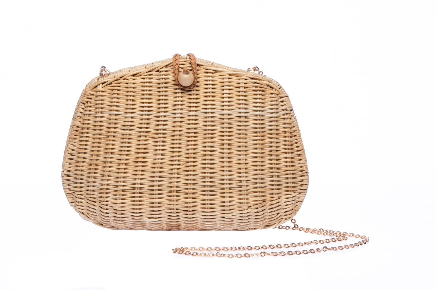Stephanie Wicker Clutch made from handwoven rattan with a removable brass chain strap, perfect for day or night wear.