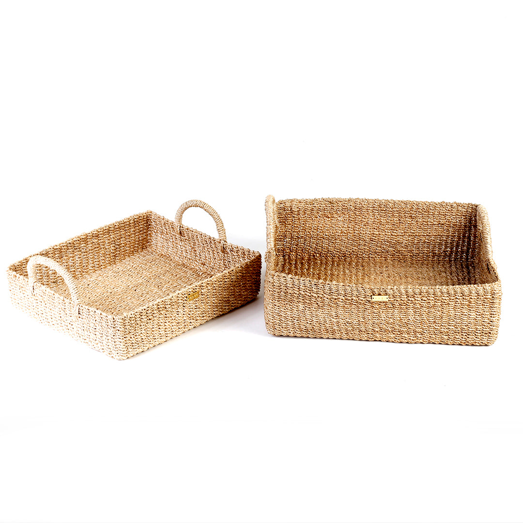Stephanie Trays Set of 2, crafted from 100% natural plant fiber, ideal for organizing and displaying items around the home.