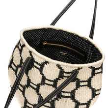 Load image into Gallery viewer, Beehive Tote Bag handwoven from natural plant fiber with leather handles and polka dot lining. Stylish and sustainable.
