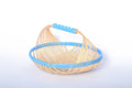 Blue Faustina Festive Fruit Basket with Handle, crafted from eco-friendly materials, perfect for carrying fresh produce, organizing kitchen essentials, or adding a decorative touch to your home. Features a sturdy handle and vibrant design for culinary adventures.