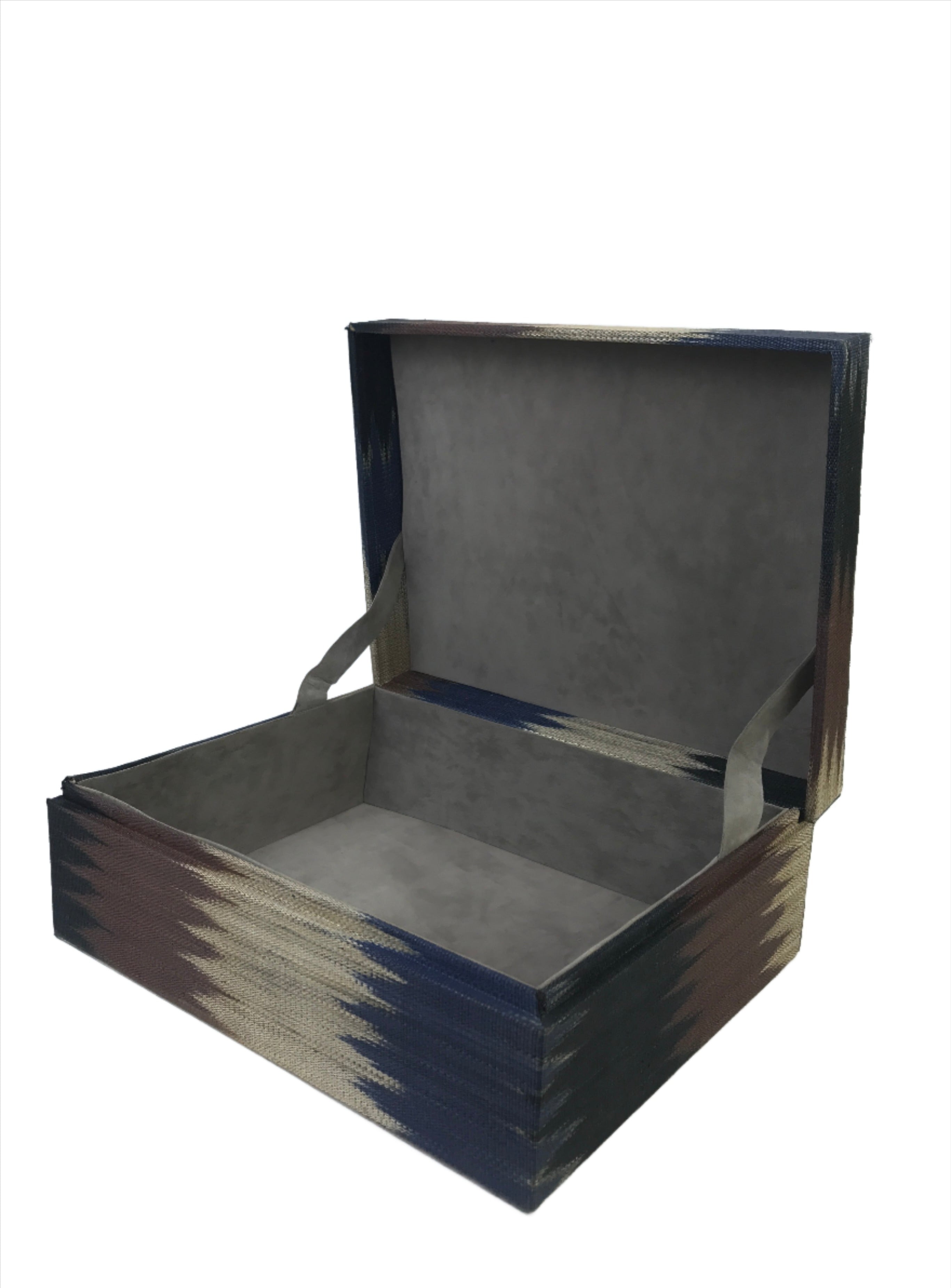 Duane Earth Colors Large Storage Box crafted from 100% abaca T’nalak fabric by the Tboli tribe. Eco-friendly storage box with intricate nature-inspired patterns, blending cultural heritage and modern design for stylish, sustainable organization.
