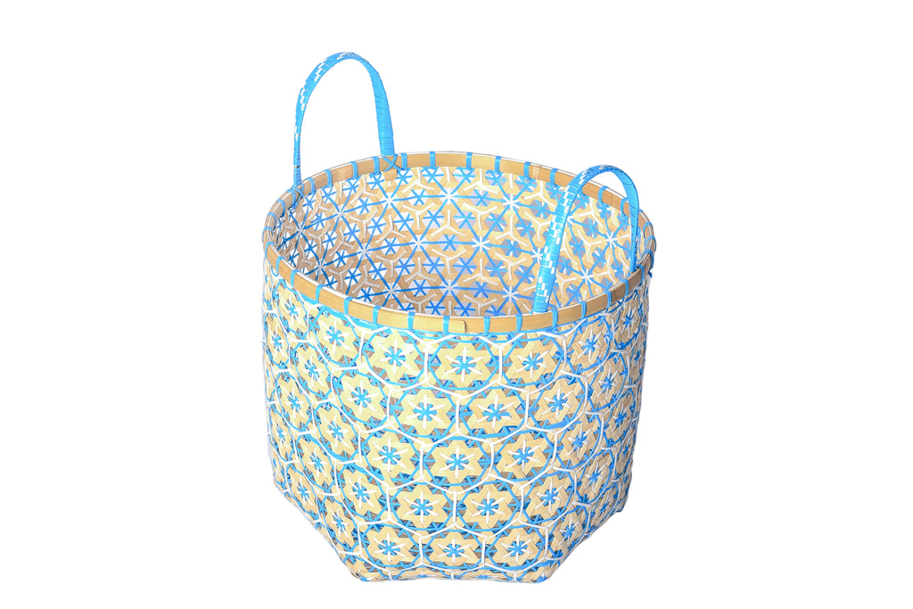Faustina Blue Festive Star Laundry Hamper crafted from 100% natural plant fiber, featuring a celestial star motif that transforms a functional item into a decorative accent. Durable and eco-friendly, this hamper enhances your living space while supporting sustainable craftsmanship.