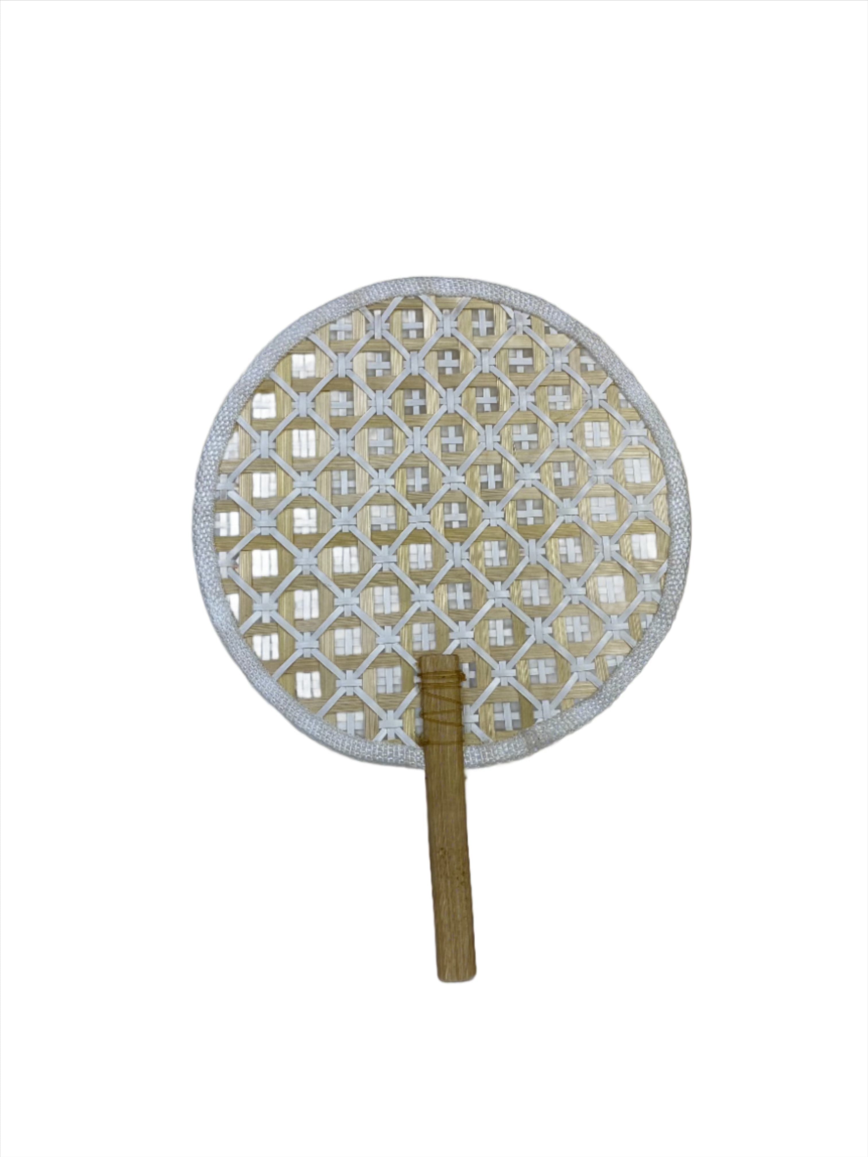 Faustina White Festive Woven Hand Fan made from eco-friendly materials, featuring a vibrant design perfect for weddings and parties. This lightweight and practical fan provides a refreshing breeze while supporting sustainability, making it an ideal accessory for celebrations.
