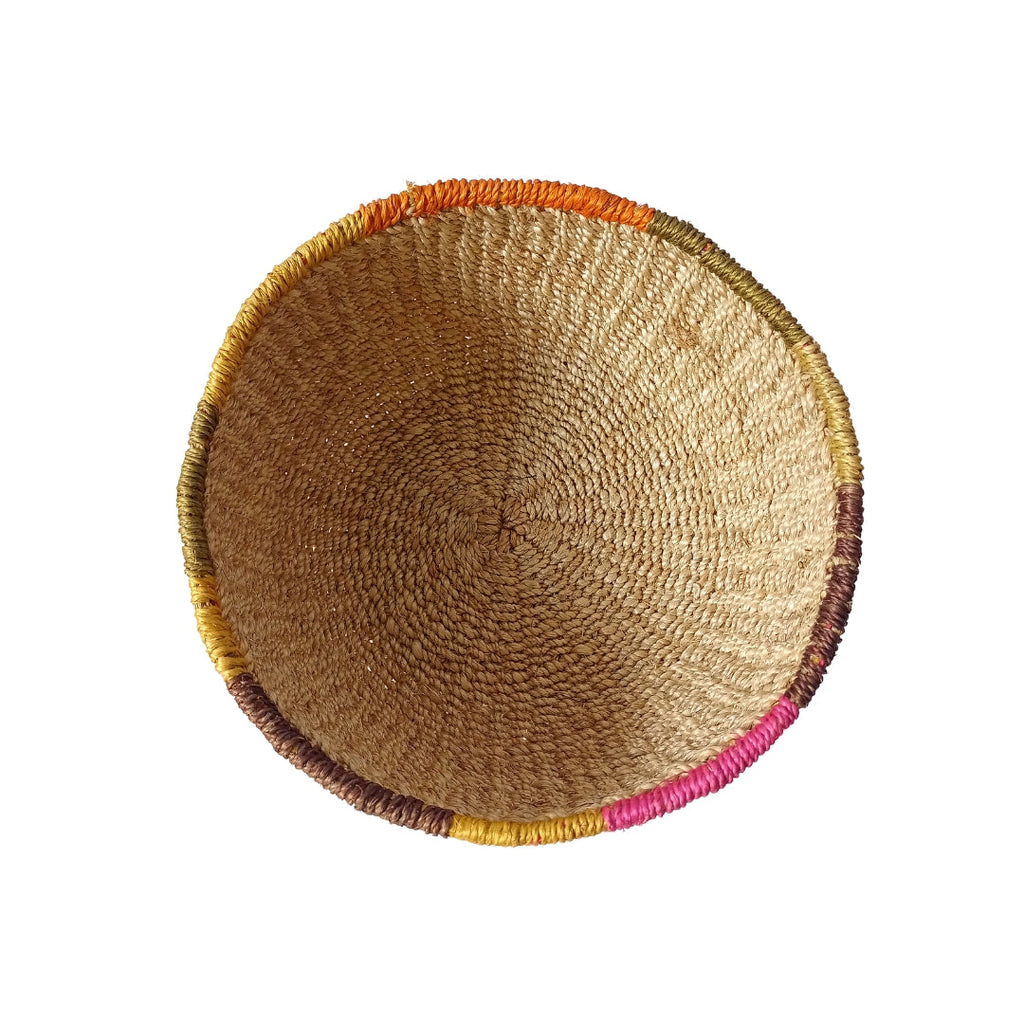 Mae Colorful Edge Fruit Bowl, handcrafted from 100% natural abaca with vibrant, dyed edges. Eco-friendly, versatile, and perfect for displaying fruit, serving snacks, or adding a decorative touch to any room.