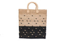 Keep your home organized with the Serene Black Rectangle Storage Basket. Handwoven from 100% natural plant fiber, this eco-friendly, stylish storage solution is perfect for laundry, sports gear, or seasonal items.