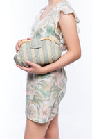 Grey two way clutch rattan handle handmade from sustainable plant fibers bags handwoven by artisans and weavers