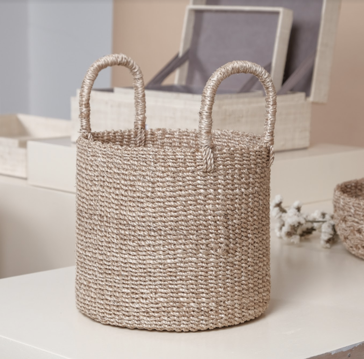 Dinah Catch All Basket made from 100% natural plant fiber, perfect for organizing essentials like keys, condiments, bath items, and vanity accessories. Versatile storage basket for entryways, kitchens, and bathrooms, adding charm and eco-friendly functionality to any space.