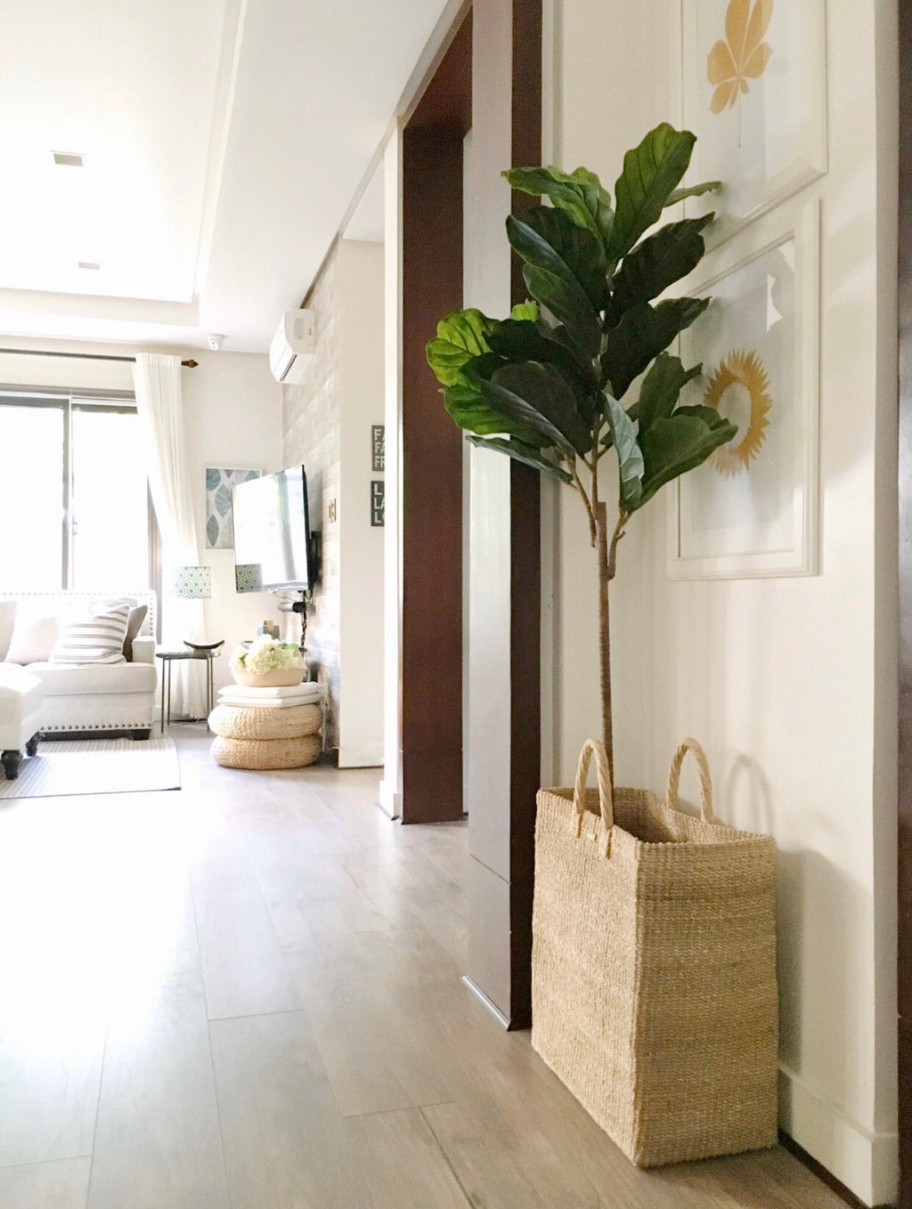 Keep your home organized with the Serene Rectangle Storage Basket. Handwoven from 100% natural plant fiber, this eco-friendly, stylish storage solution is perfect for laundry, sports gear, or seasonal items.