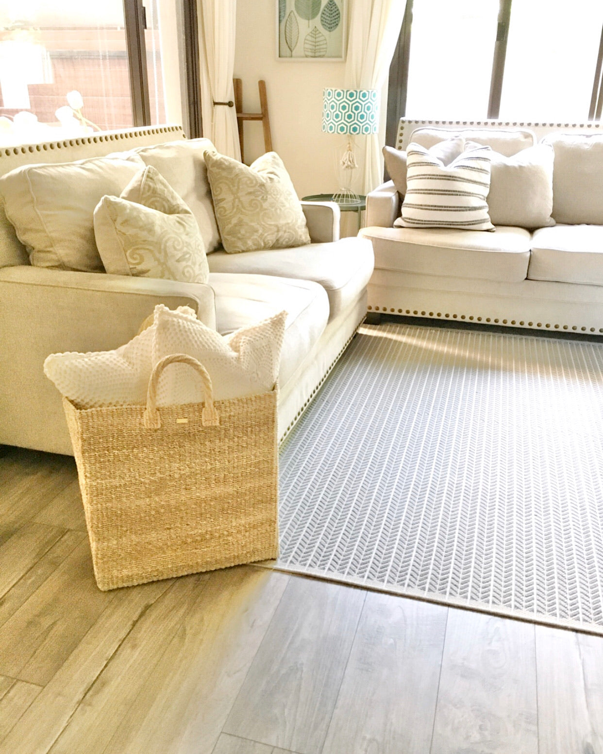 Keep your home organized with the Serene Rectangle Storage Basket. Handwoven from 100% natural plant fiber, this eco-friendly, stylish storage solution is perfect for laundry, sports gear, or seasonal items.