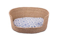 Eco-friendly Tippy Pet Bed made from 100% natural plant fiber with a stylish Inabel handwoven fabric cushion. Perfect for small dogs and cats, offering comfort and sophistication for modern Filipino interiors.