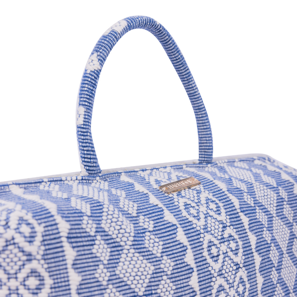 Hazel Inabel Blue Ribbon Laptop Pillow made from traditional Abel Iloco handloomed fabric with a faux suede non-slip top and convenient handle for easy portability.