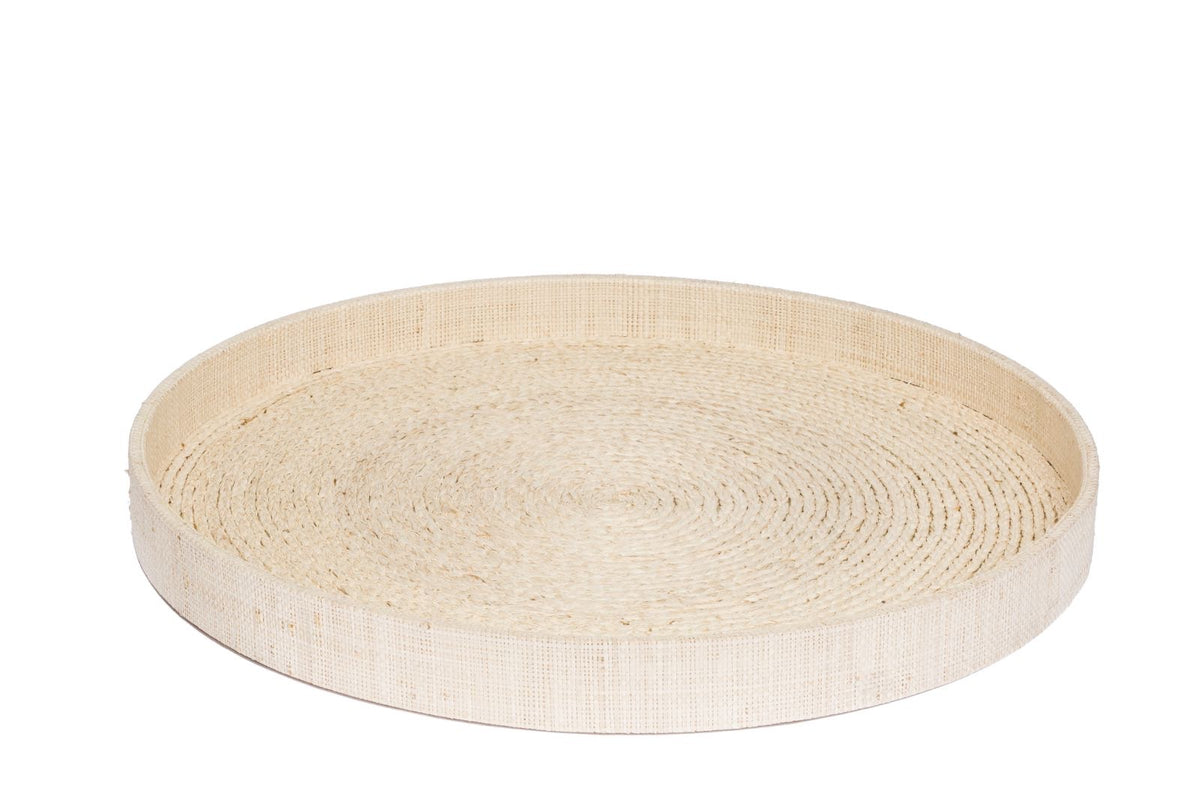 A round woven tray made of natural beige raffia or straw material, photographed on a clean white background.