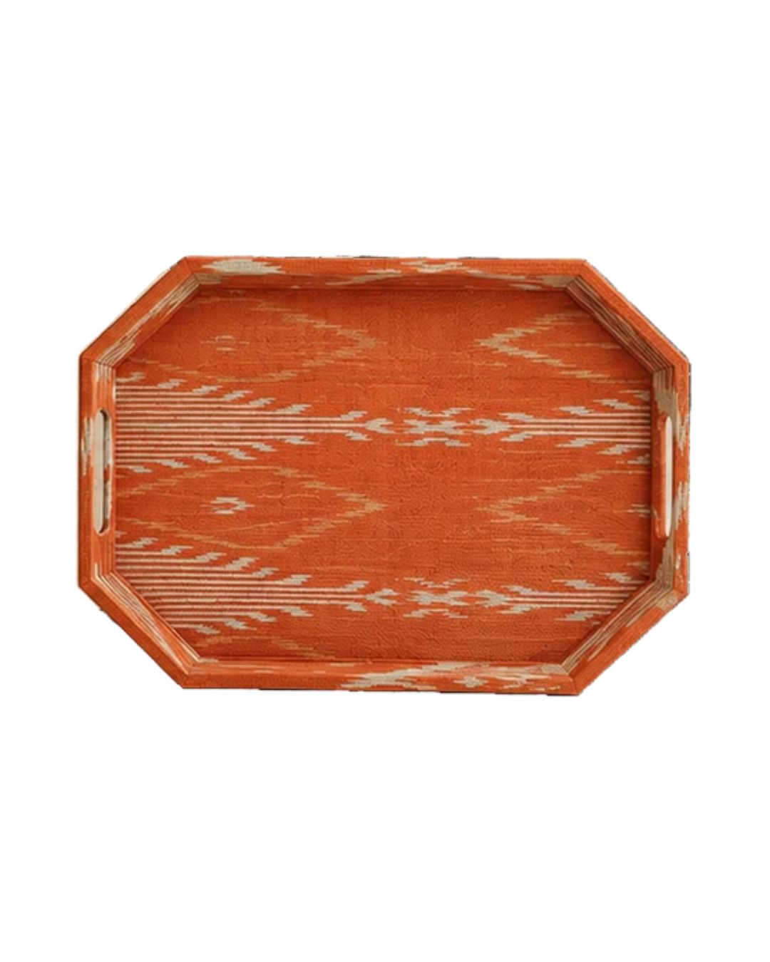 An octagonal wooden serving tray with a distressed orange and cream ikat pattern, shown from a top-down view on a white background.