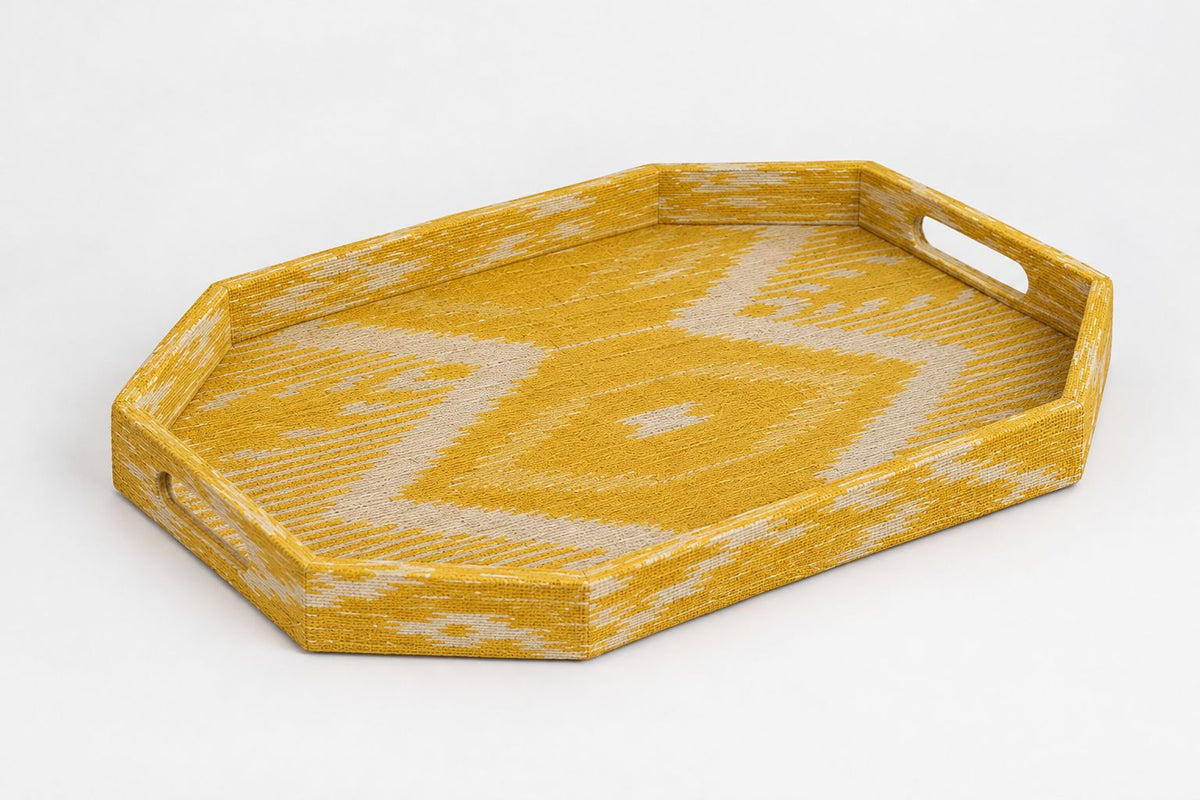 Mustard yellow and beige woven fabric octagonal ottoman tray displayed flat against a plain background.