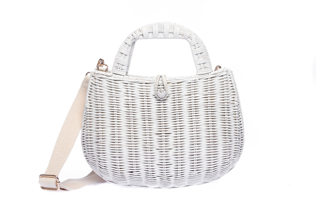 Handwoven Abi Wicker White Rattan Shoulder Bag with adjustable cotton strap and brass hardware, made by artisans in the Philippines. Sustainable and stylish.