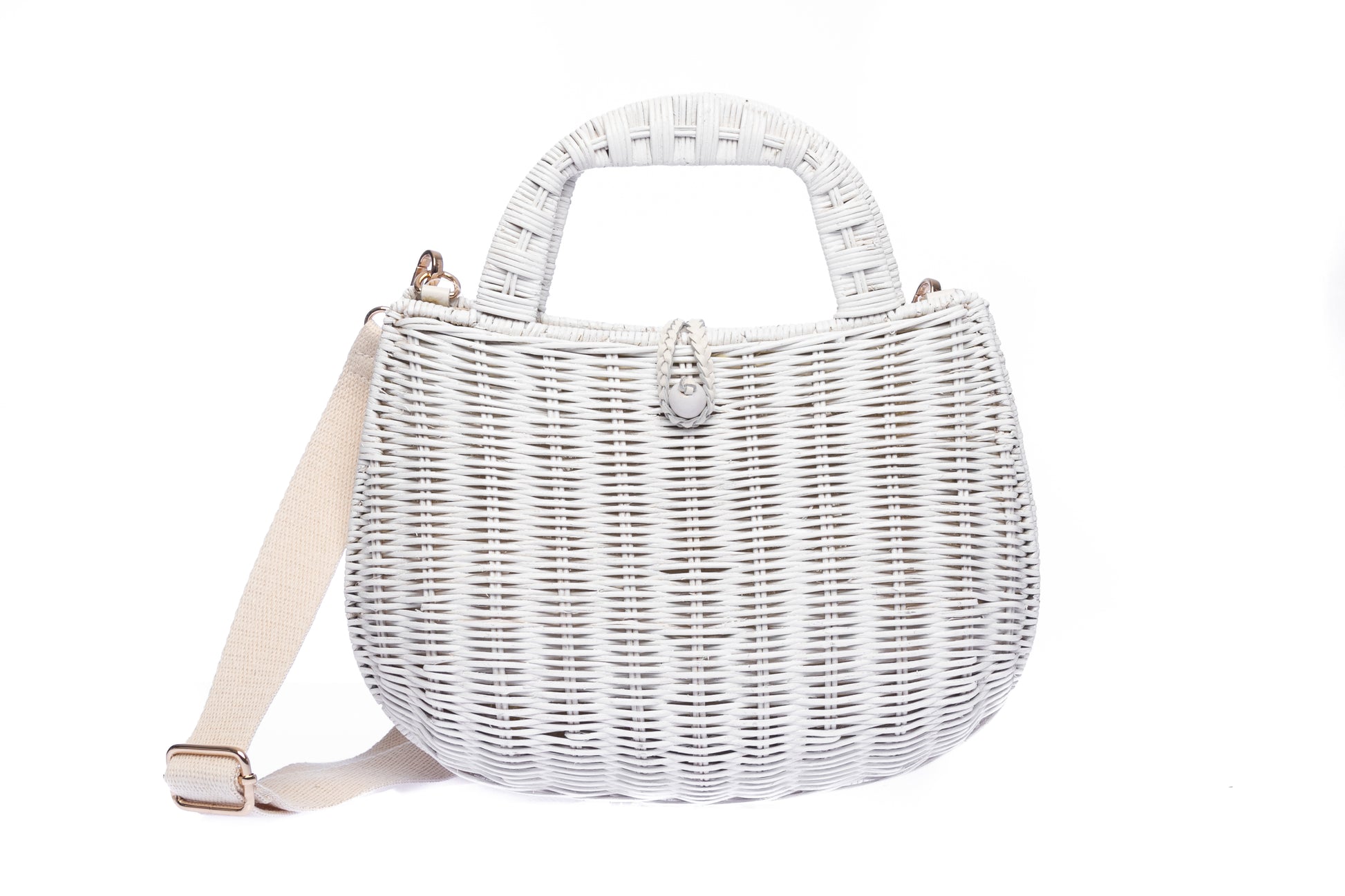 Handwoven Abi Wicker White Rattan Shoulder Bag with adjustable cotton strap and brass hardware, made by artisans in the Philippines. Sustainable and stylish.