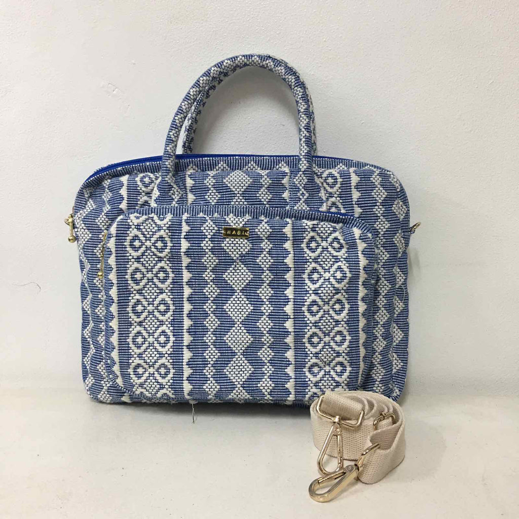 Handwoven Abel Iloco laptop bag with geometric designs, faux suede non-slip top, and handle. Ethically crafted in the Philippines.