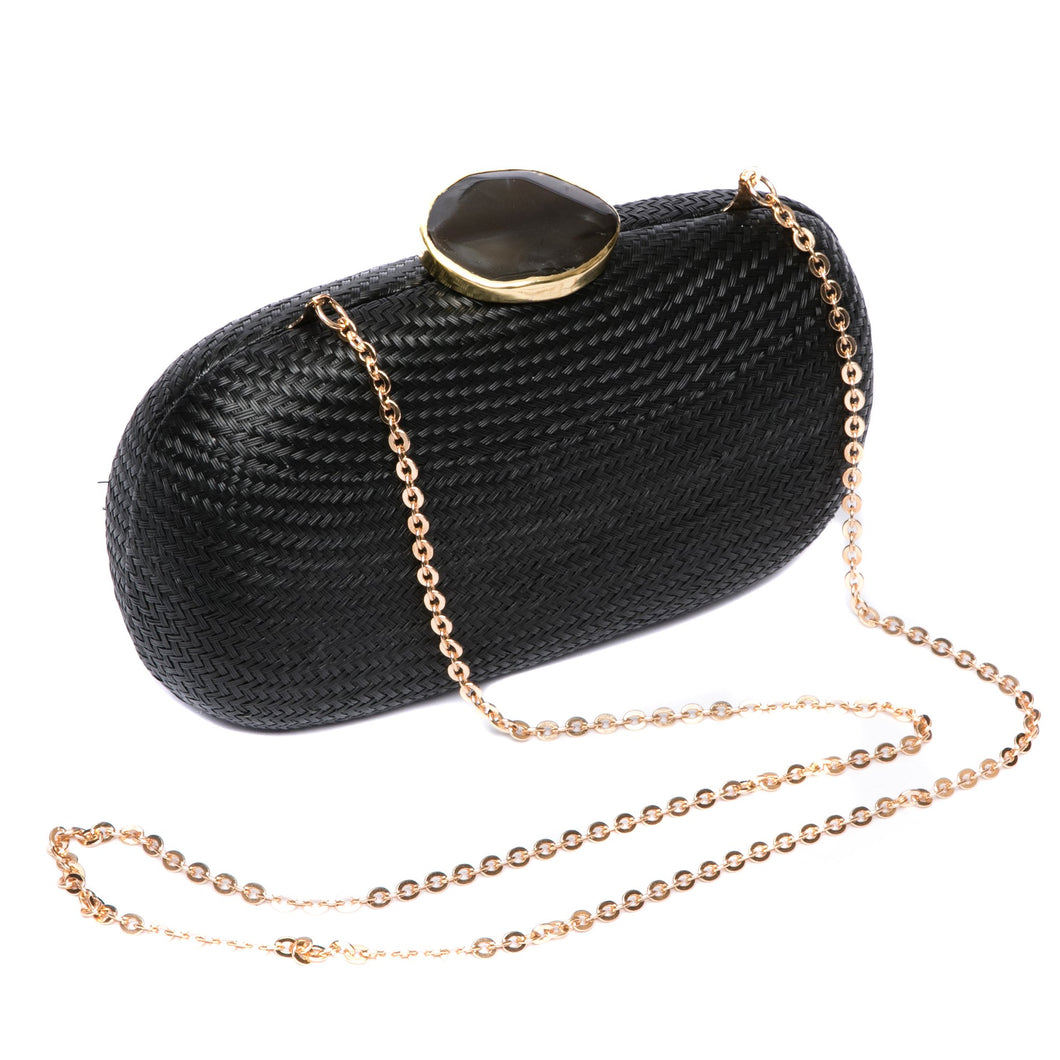 Dark Sky Oval handwoven clutch with agate stone and brass chain strap, perfect for evening events. Ethically made in the Philippines.