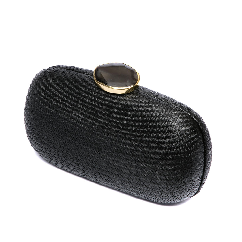 Dark Sky Oval handwoven clutch with agate stone and brass chain strap, perfect for evening events. Ethically made in the Philippines.