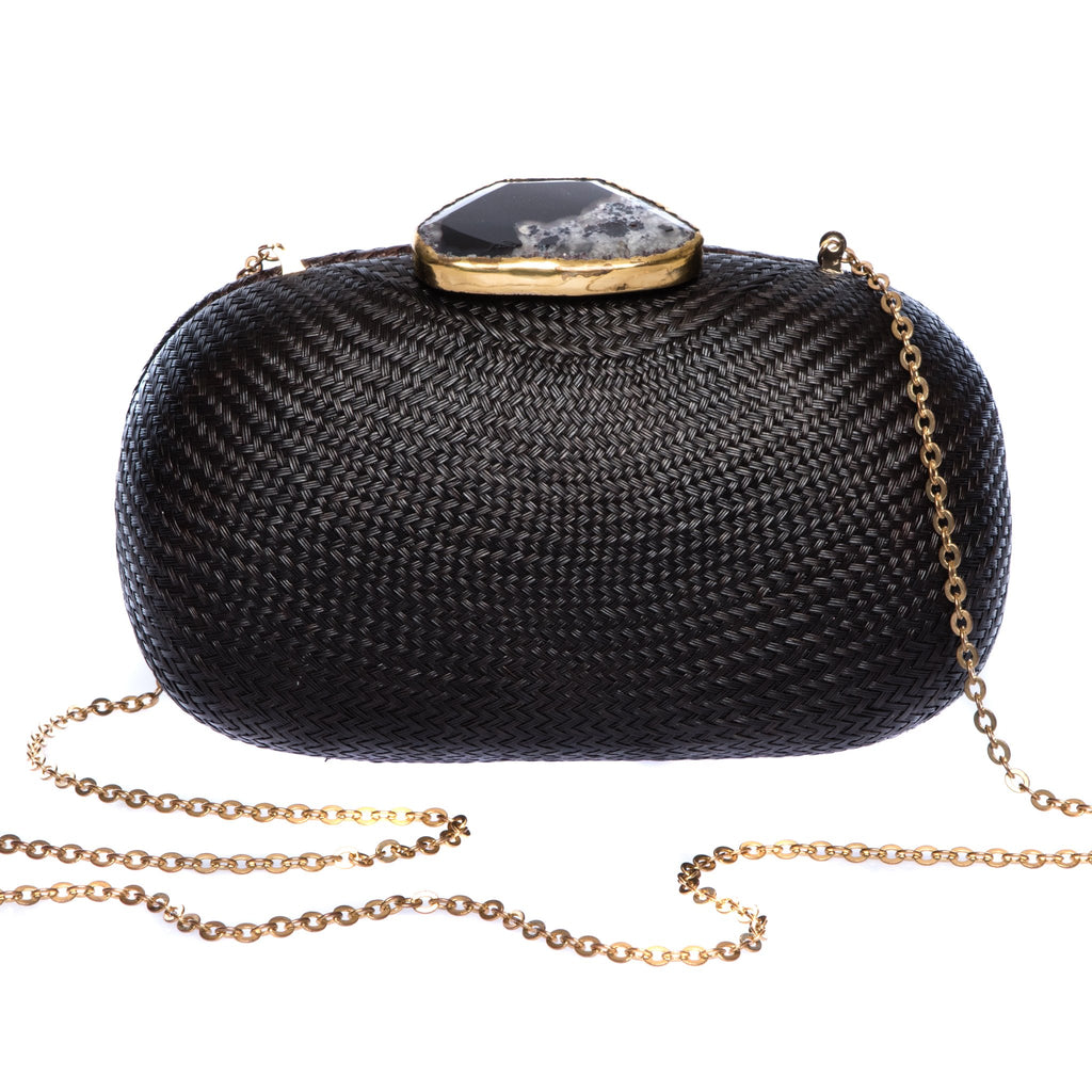 Dark Sky Oval handwoven clutch with agate stone and brass chain strap, perfect for evening events. Ethically made in the Philippines.