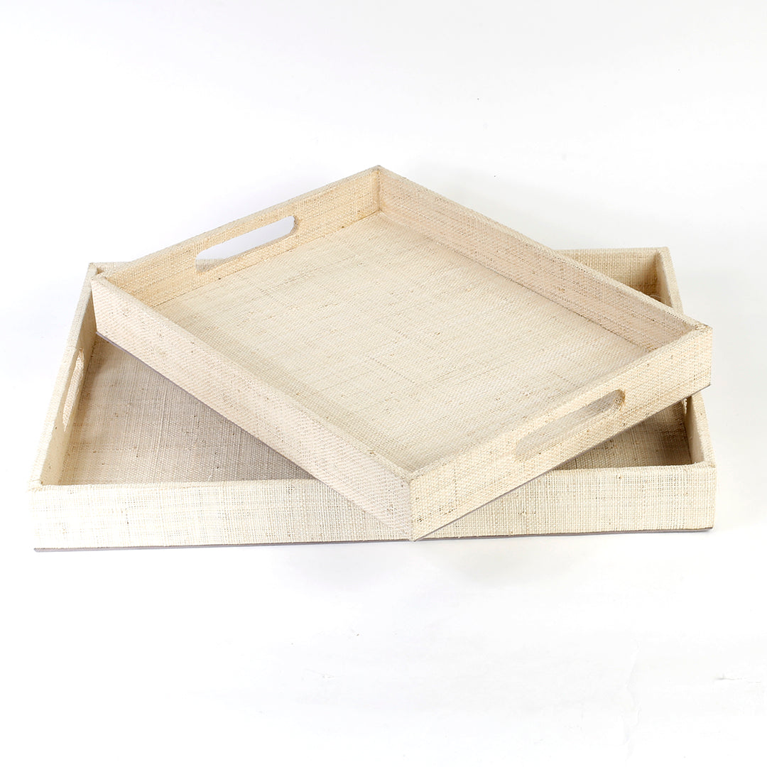 Set of 2 Adie serving trays made from 100% natural plant fiber, ideal for displaying keepsakes or serving snacks.