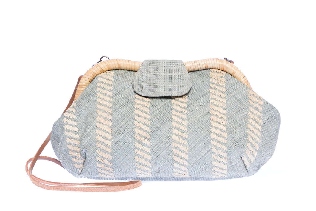 Grey Skye Signature Clutch – Handwoven raffia and rattan clutch with hand embroidery, featuring a removable leather strap for versatile styling.