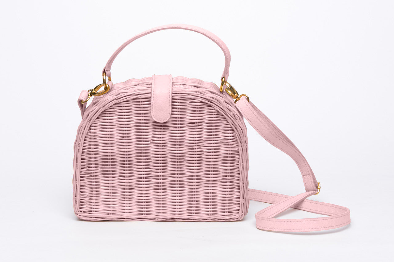 Half Moon Wicker Purse Blush Pink – Handwoven natural wicker bag with soft nude leather strap and magnetic closure, perfect for everyday wear.