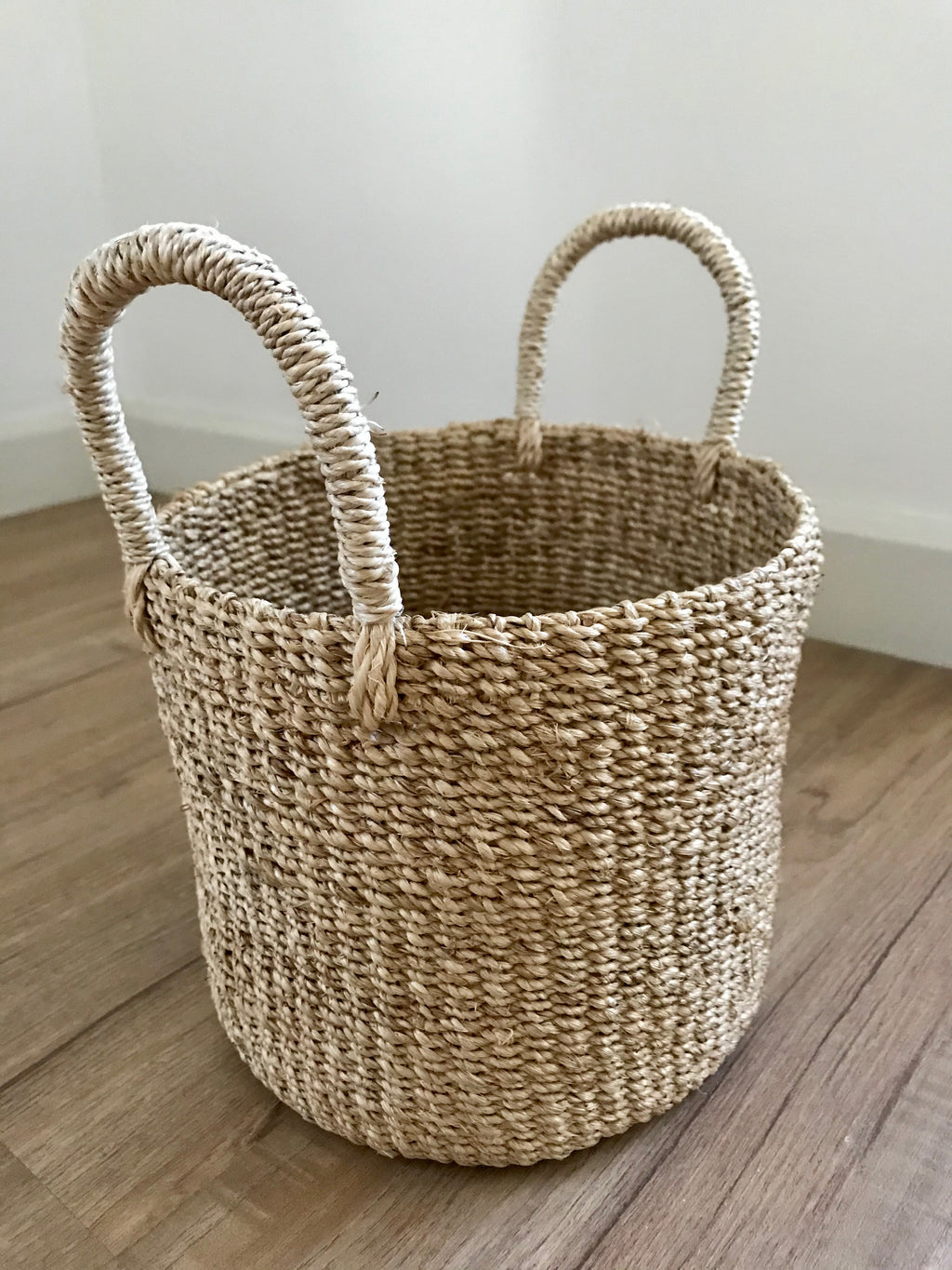 Dinah Catch-All Basket made from 100% natural plant fiber, ideal for organizing keys, spices, bath essentials, or as a planter cover.