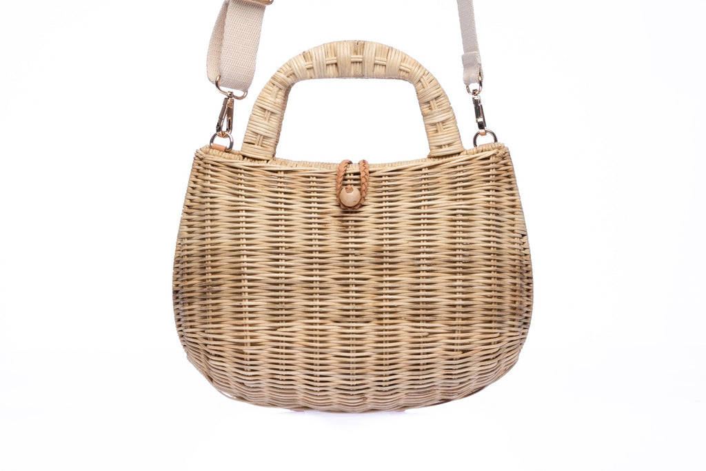 Handwoven Abi Wicker Natural Rattan Shoulder Bag with cotton strap and brass hardware, eco-friendly design, and artisan-crafted in the Philippines.