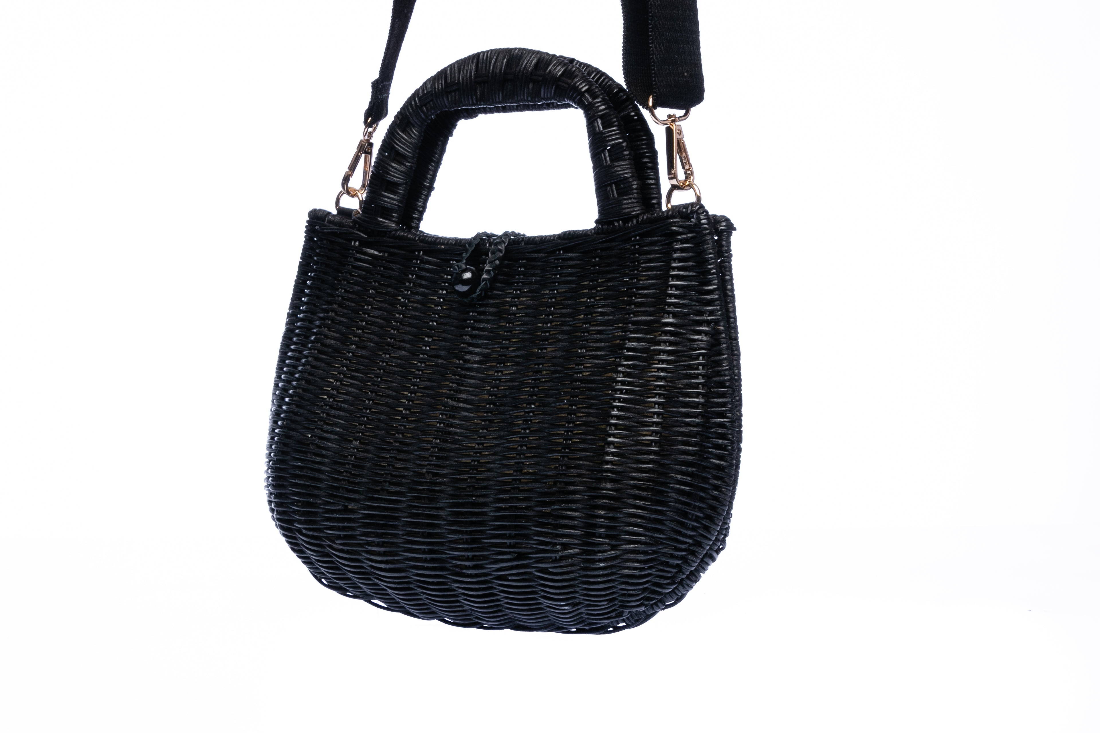 Handwoven Abi Wicker Black Rattan Shoulder Bag with cotton strap, brass hardware, and eco-friendly design, crafted by artisans in the Philippines.