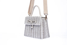 Load image into Gallery viewer, Adie wicker white shoulder bag, handwoven from sustainable rattan, featuring a cotton strap and brass hardware. Eco-friendly and stylish.
