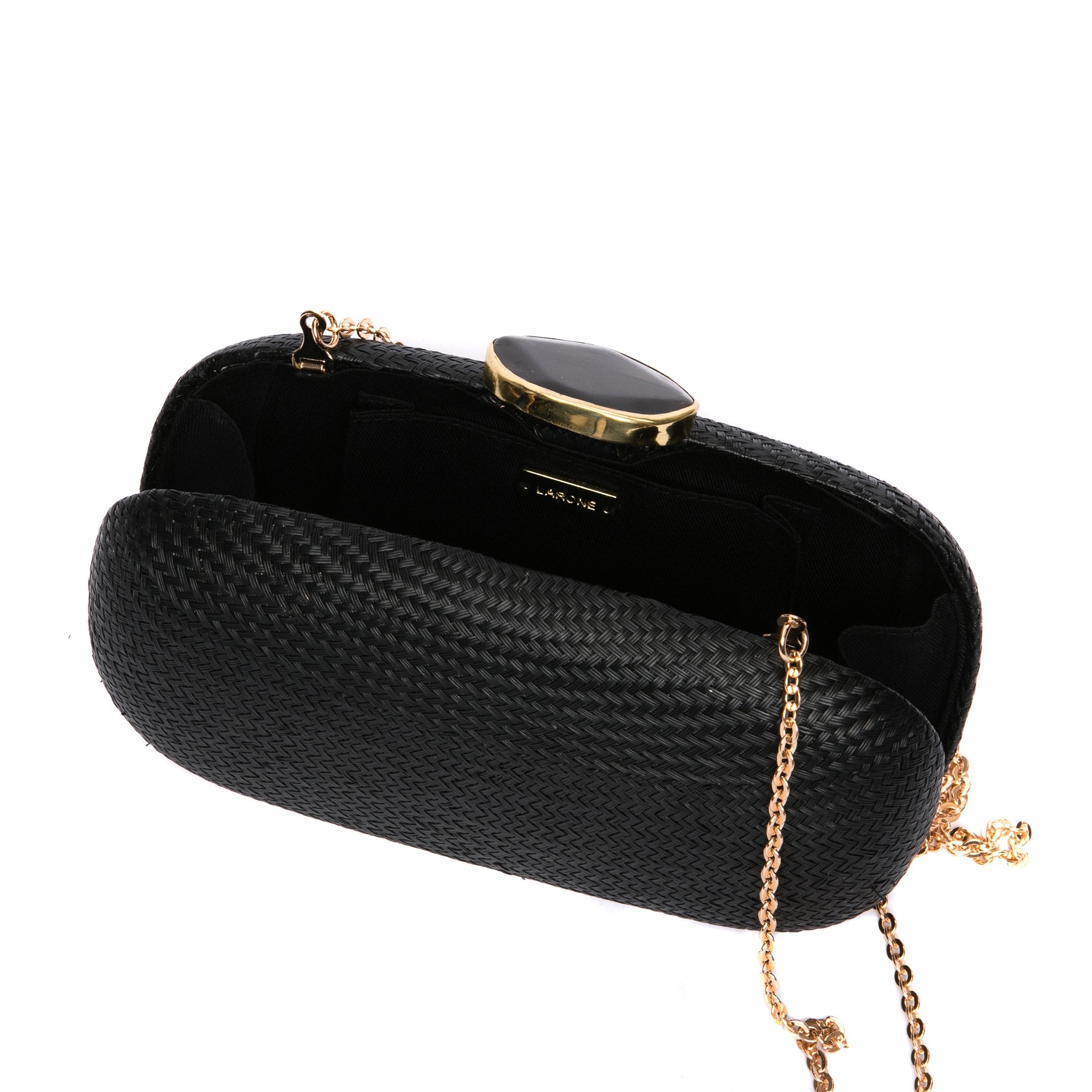 Dark Sky Oval handwoven clutch with agate stone and brass chain strap, perfect for evening events. Ethically made in the Philippines.