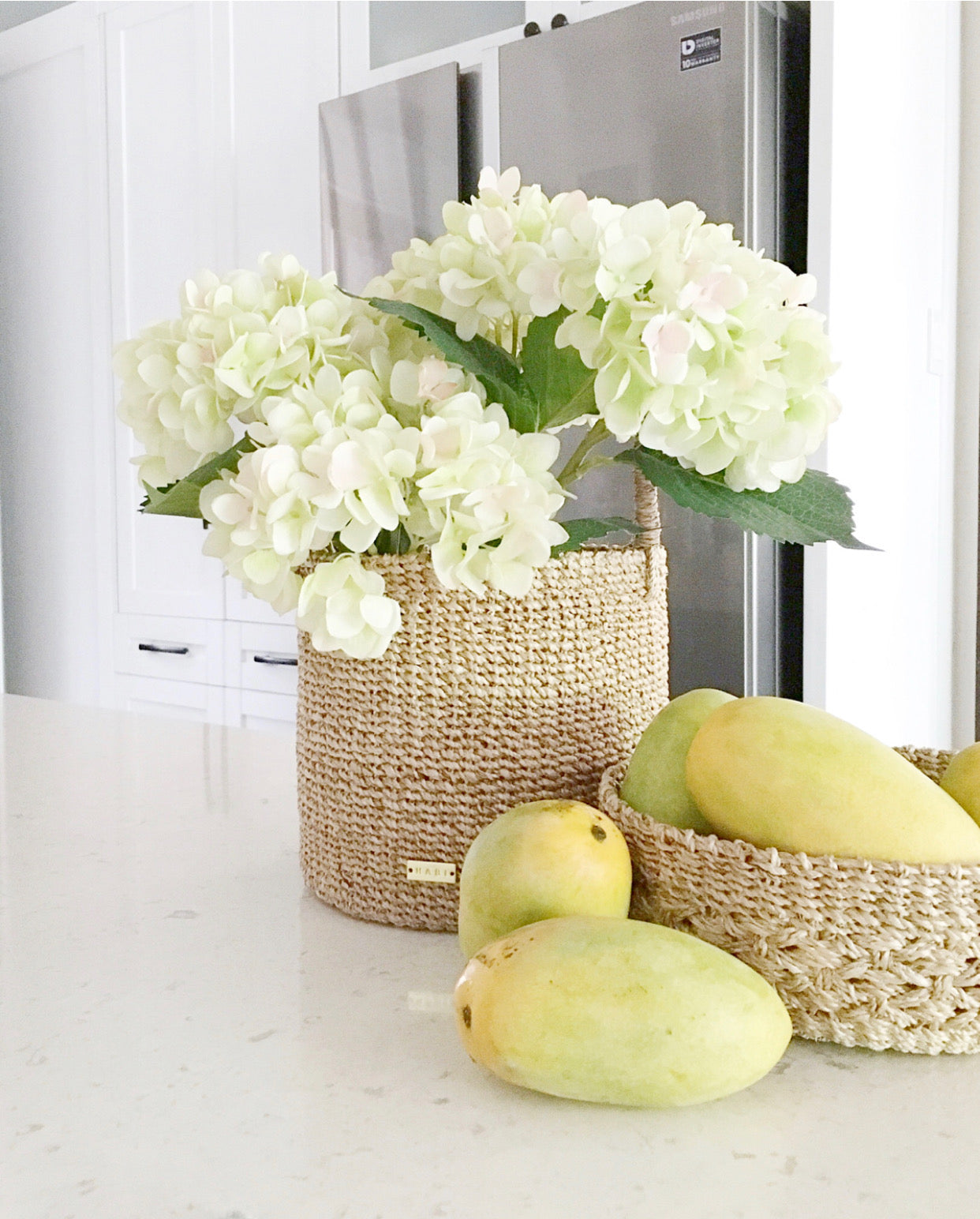 Dinah Catch-All Basket made from 100% natural plant fiber, ideal for organizing keys, spices, bath essentials, or as a planter cover.